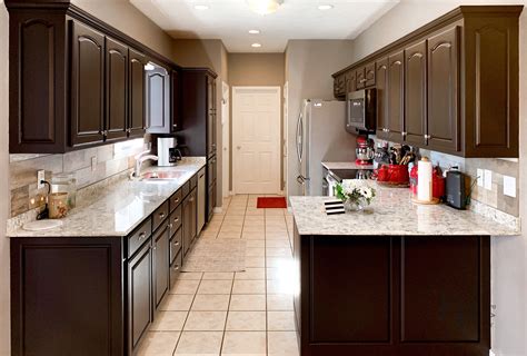 espresso cabinets with white countertops